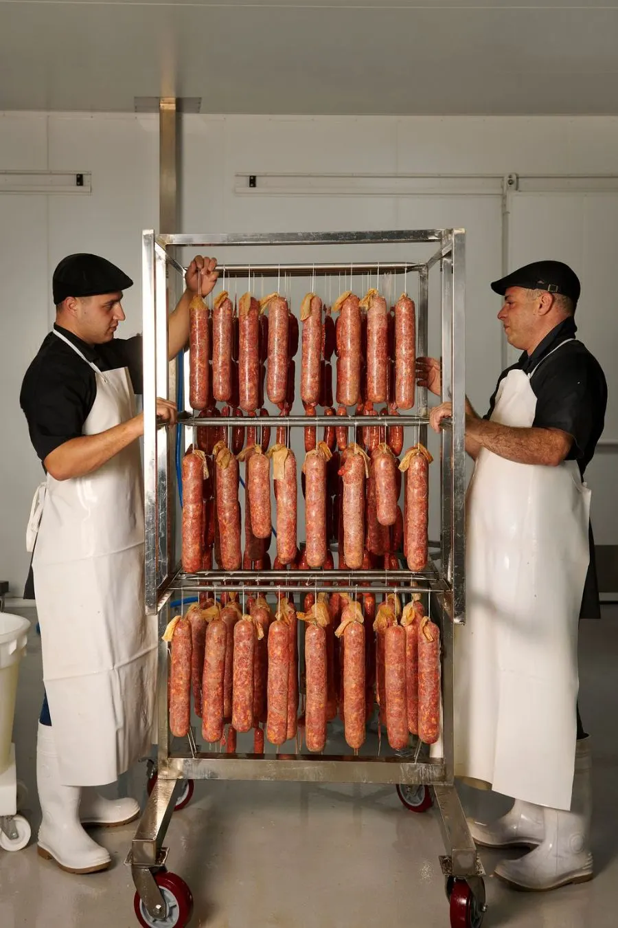 Salami on the curing rack